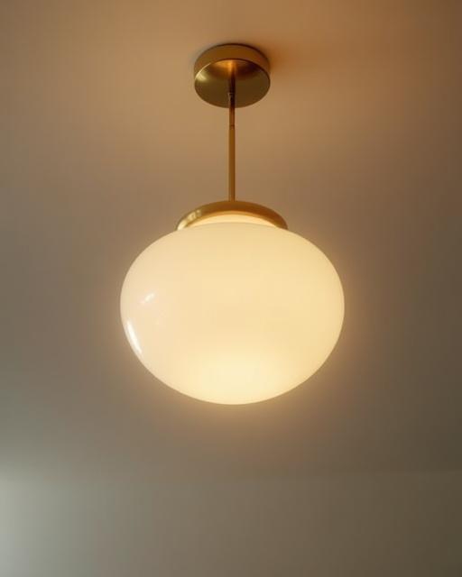 Custom brass and glass pendant light